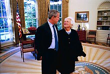 Barbara Bush and George W. Bush stand side by side