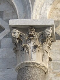 Capital of Corinthian form with anthropomorphised details, Pisa Campanile, Italy