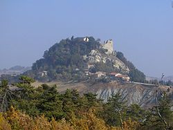 View of the Rock of Canossa with the ruins of the castle visible at the top