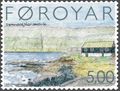 Sigmundsgjógv in Sandvík. Hierher flüchtete der erste färöische Christ Sigmundur Brestisson, und hier wurde er ermordet. Briefmarke von 2004.