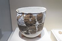 20,000–10,000-year-old pottery found in the cave, with re-construction repairs.[4]
