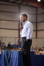 President Barack Obama addresses a town hall meeting on health care insurance reform inside a hangar at Gallatin Field in Belgrade, Mont., on Aug. 14, 2009