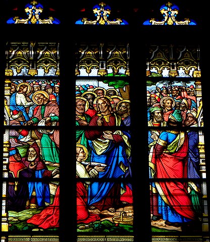 One of the lancets of the transept window. Jesus feeds the 5000