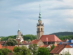 Skyline with the towers of the town hall (on the left) and of the Saints Peter and Paul Church (on the right)
