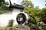 Moon gate at Couple's Retreat Garden in the Classical Gardens of Suzhou