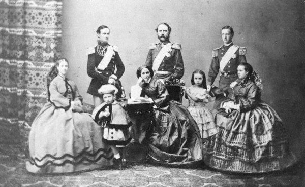 An image of King Christian IX and Queen Louise of Denmark with their children.