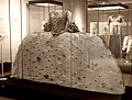 [127]"Mantua gown made from an ivory silk brocaded in a pattern of stylised flowers and leaves."