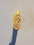 Etruscan gold ring depicting a siren, sphinx, and hippocamp