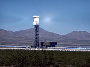 Ivanpah's eastern tower online. Note the sunlight glare on either side of the boiler.
