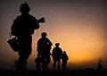 U.S. Marines conducting a dawn patrol in Afghanistan's Nawa District, Helmand Province, 2010