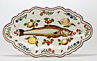 Polychrome majolica dish with paintings of a fish, flowers, and fruit, Lodi, Italy, 1751