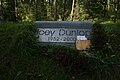 Gedenkstein für Joey Dunlop († 2000) an der Unglücksstelle in Pirita-Kose-Kloostrimetsa