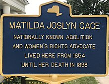 A plaque that reads "Matilda Joslyn Gage nationally known abolition and women's rights advocate lived here from 1854 until her death in 1898"
