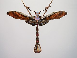 Insects – Libelle ('Dragonfly'), pendant made of gold, opal, enamel, rubies and diamonds by Philippe Wolfers (1902)