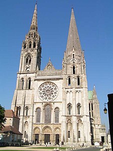 Rose window and facade of Chartres Cathedral (1194–1220) (North spire rebuilt in Flamboyant style from 1507 to 1513