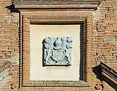 Arms in facade of castle