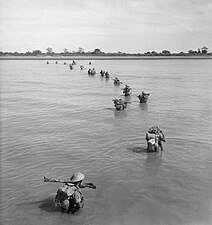 Indian soldiers wade ashore at Akyab