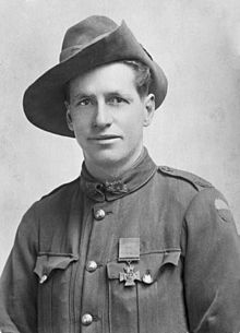 A head and shoulders portrait of a male in uniform