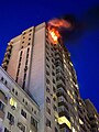 Residential building in Kyiv which caught fire due to falling of fragments of a downed Russian drone, 30 May 2023
