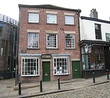 Photograph of the original Rochdale Pioneers shop, now home to the Rochdale Pioneers museum.