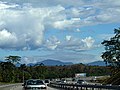 The Titiwangsa Mountains tower over the North-South Expressway in Slim River, Perak.