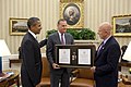 Barack Obama and James R. Clapper presented the National Intelligence Distinguished Service Medal to James L. Jones. (October 20, 2010)