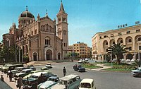 The old Tripoli Cathedral (now a mosque) and the former FIAT center (Algeria Square) during the 1960s