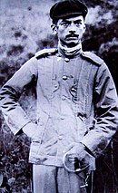 A mustachioed Quezon in military uniform