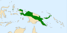 Map of New Guinea, with green shading indicating that the species occurs in a horizontal band across the island