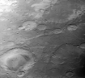 Oblique view from Viking Orbiter 1 of Henry crater (lower left), Barth crater (lower right), and Arago crater (upper right)