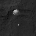 Curiosity descending under its parachute (6 August 2012; MRO/HiRISE).