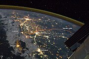 The floodlit border zone between Pakistan and India seen from outer space.