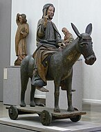 Jesus on donkey carving used for donkey walks, late 14th century