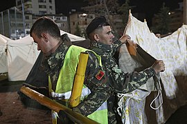 Members of the Albanian army involved in relief work