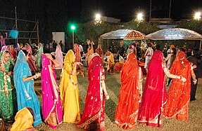 Women dancing in gagra choli during wedding in Delhi