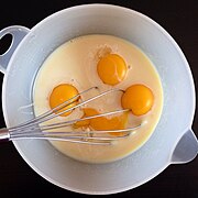 Egg yolks are added to condensed milk and lemon juice