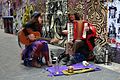 Buskers perform in front of street murals near Degraves Street, 2007
