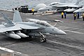 An F/A-18F Super Hornet assigned to the "Black Knights" of Strike Fighter Squadron 154 lands on the flight deck of Ronald Reagan while the carrier is underway in the Pacific Ocean in 2010