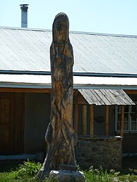 Carved tree trunk, Peñasco, New Mexico