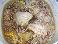 Southern Chinese-style chicken soup with mushrooms and corn pieces