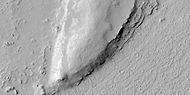 Close view of layers from previous image, as seen by HiRISE under HiWish program Some dark slope streaks are visible.