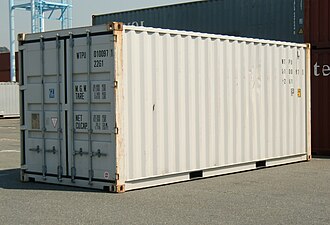 Standard 20-foot ISO shipping container with standard corner castings on each of its eight corners.
