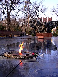 Eternal flame in front of the sculpture
