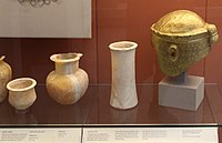 Alabaster vases and helmet from the grave of Meskalamdug, grave PG 755