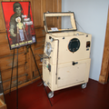 A pediatric iron lung. This artifact is not original to the hospital.