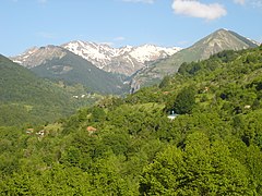 View of Ribnica and Tanuše villages with peaks and mountain pass of Korabska Vrata in background