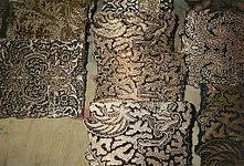Selection of cap copper printing blocks with traditional batik patterns