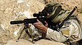 A U.S sniper looks through the scope of a Mk 12 Mod 1 Special Purpose Rifle.