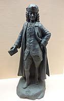 Voltaire in black basalt, modelled by Anthony Keeling, c. 1779. One of relatively few standing figures.
