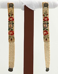 White velvet garters with floral pattern, from the collection of Conner Prairie